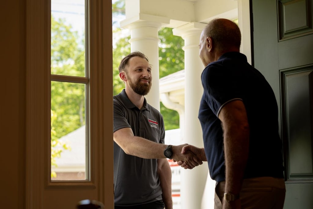 garage door won't open men welcomes Cunningham worker inside house