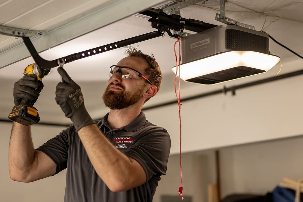 Cunningham team member working on a garage opener