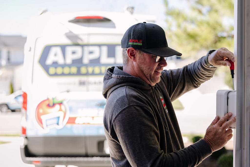 Apple Door tech doing repairs