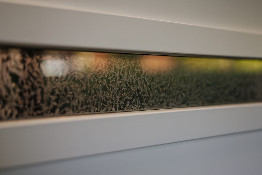 Garage door window freezing with cold weather