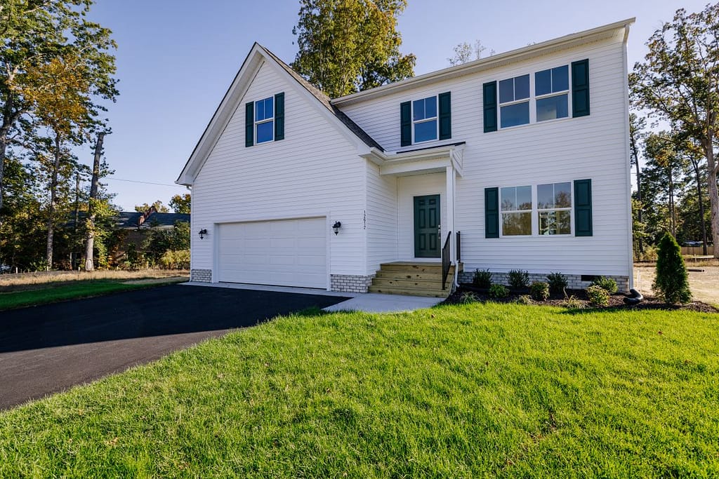 House with a traditional raised panel door