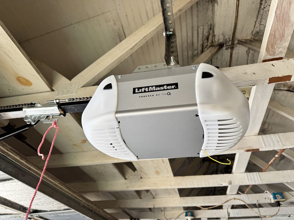 LiftMaster brand garage door opener installed in a garage