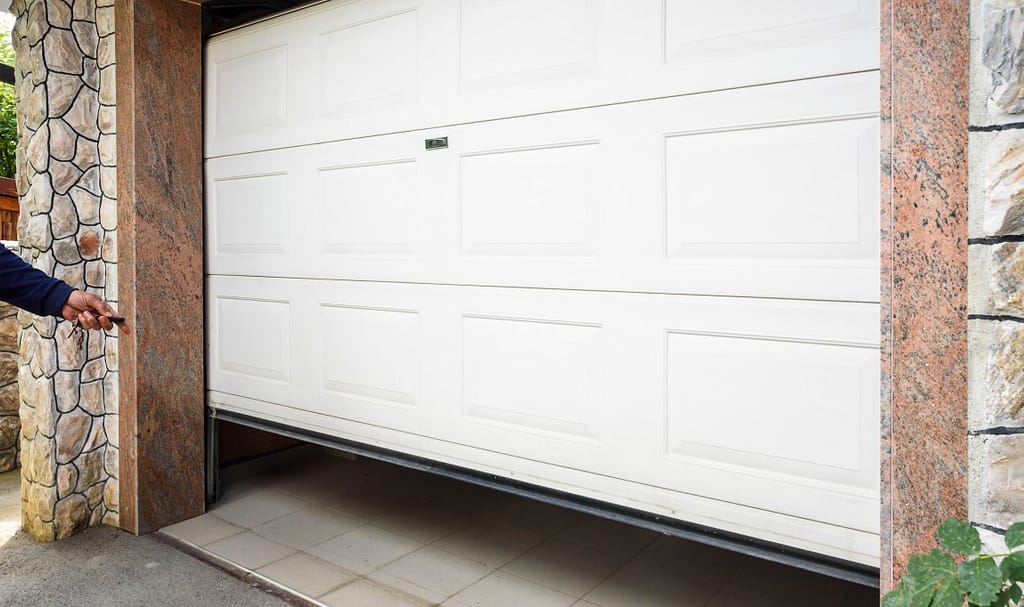 opening garage door off its tracks