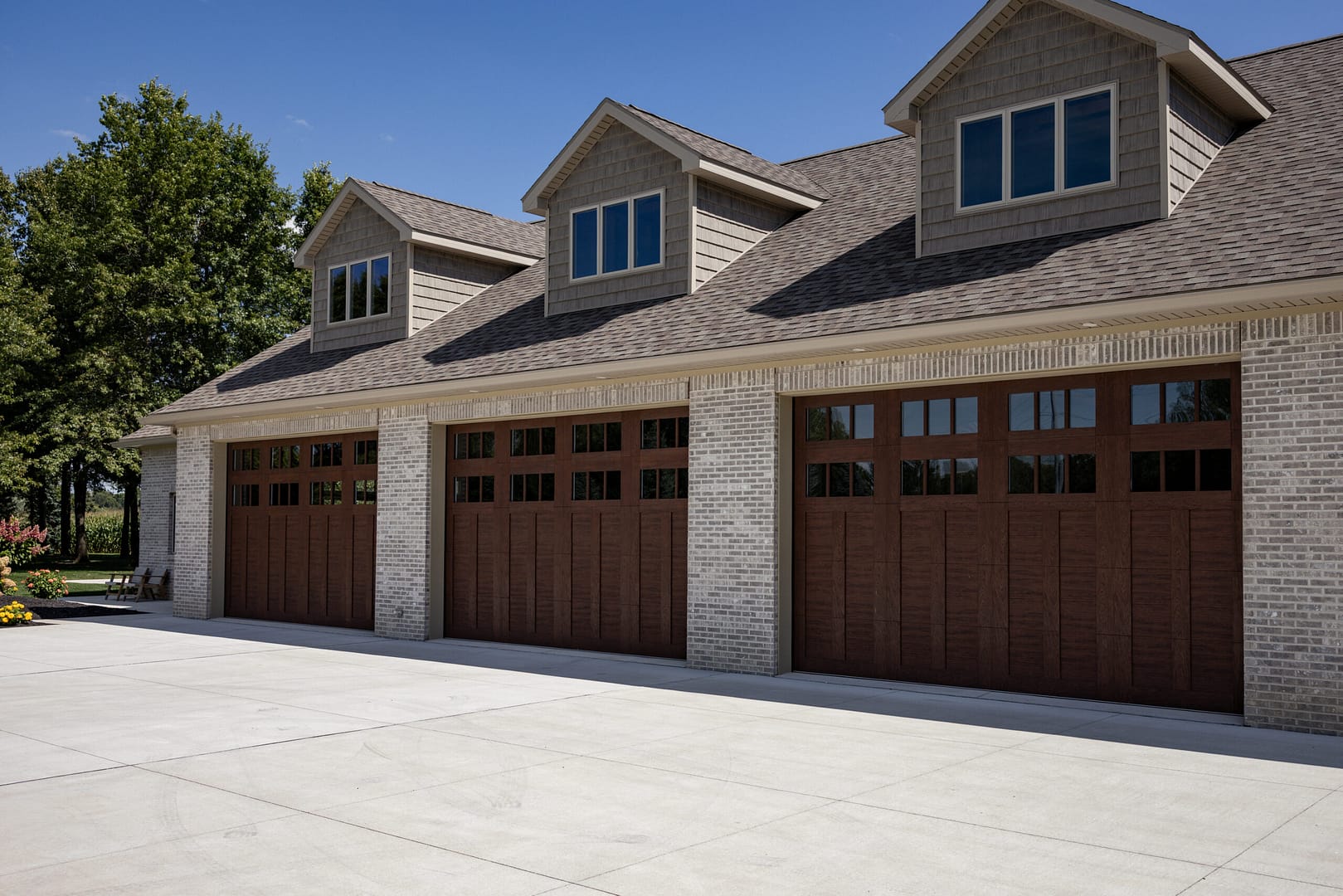 three door wooden garage door clopay