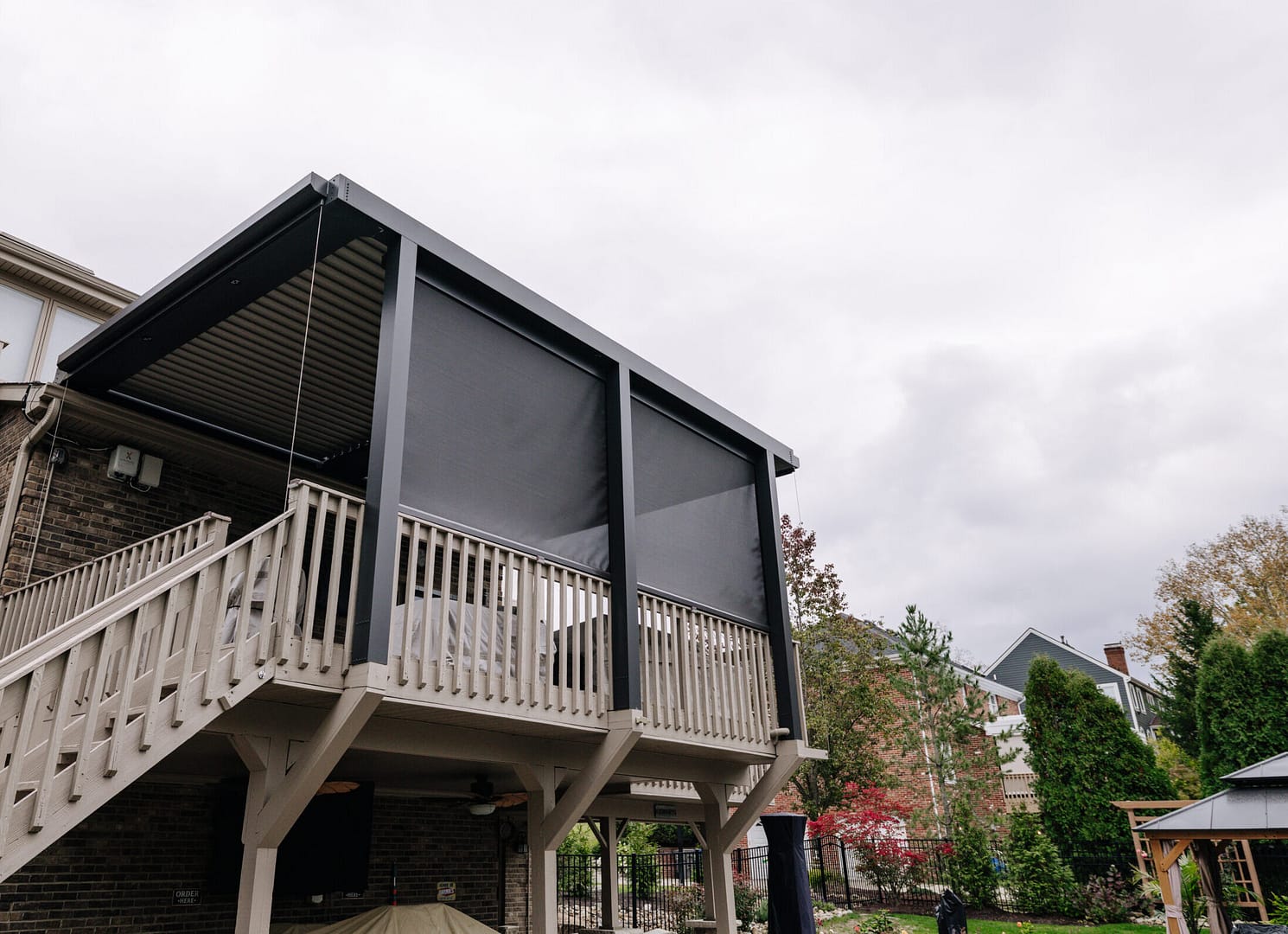 black screen surrounding porch