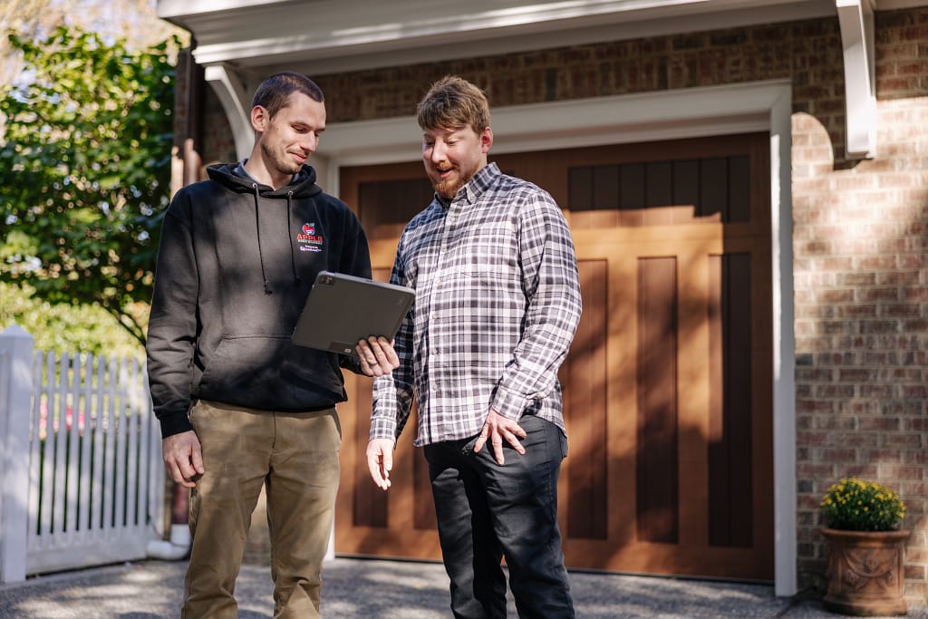 how to program garage door opener client and worker talking about project